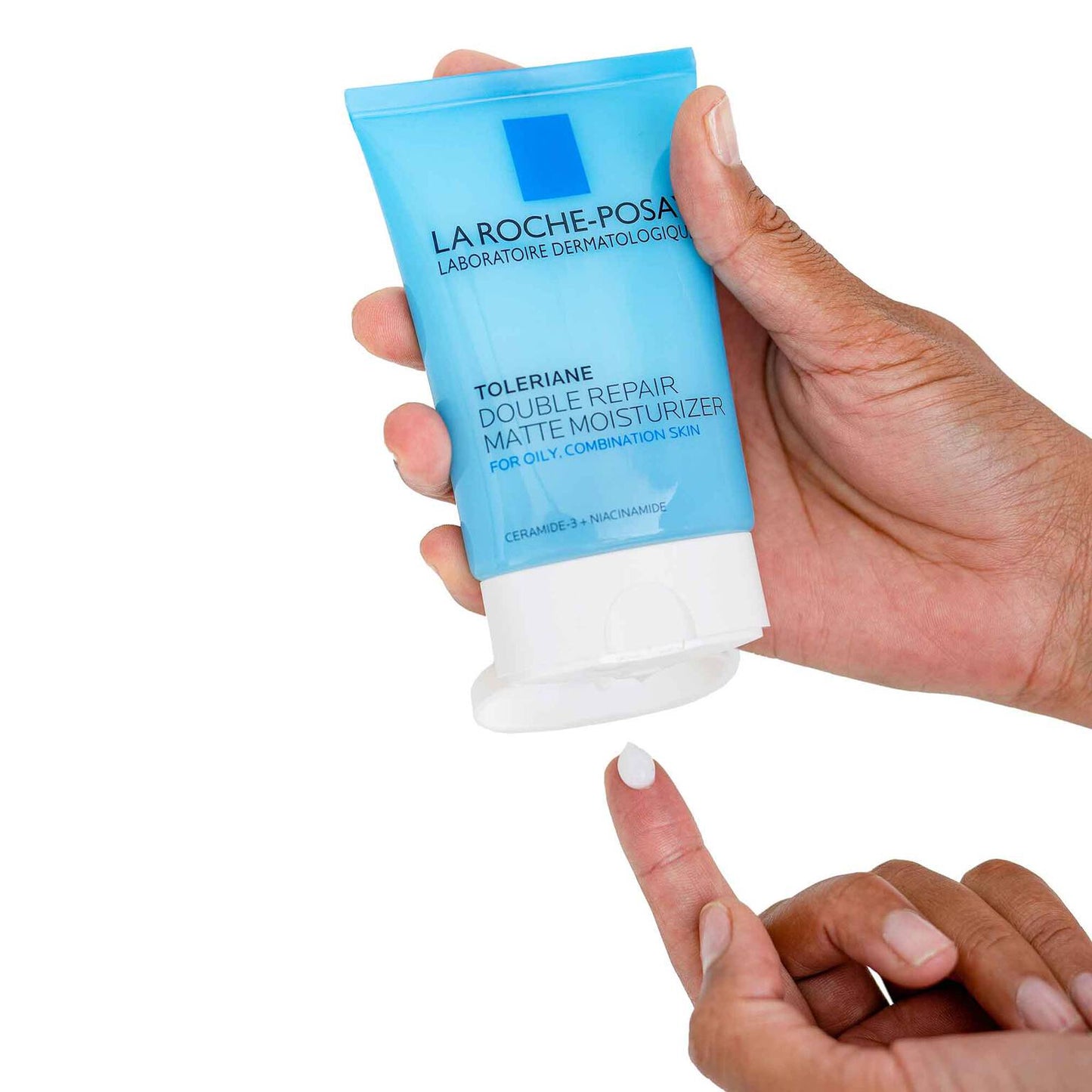toleriane-double-repair-matte-face-moisturizer-for-oily-skin-s7 la-roche-posay-toleriane-matte-lotion-on-finger.jpg